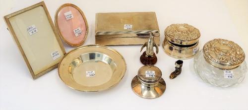 Silver and silver mounted wares, comprising; a rectangular table cigarette box, wooden lined within, Birmingham 1969, a circular dish, diameter 14cm,...