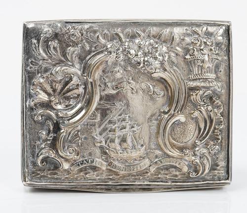 A George III Irish interst rectangular silver snuff box, apparently unmarked, the hinged cover embossed with shells, flowers, a basket of flowers and...