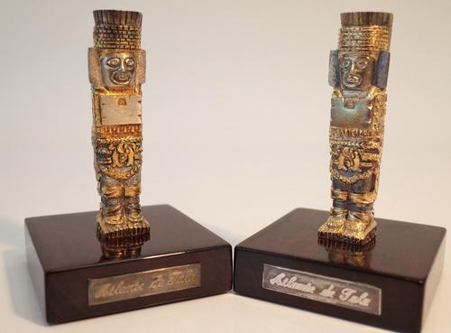 A Tane Mexico pair of figures, designed as warriors, with gilt highlighted decoration, detailed 925, displayed on square wooden bases, with pouches...