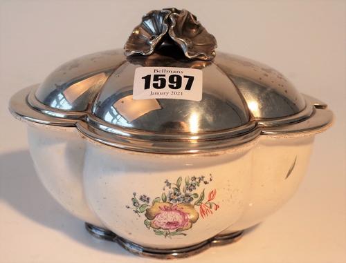 A French silver lidded Chantilly ceramic sauce tureen and cover, of quatrefoil shaped form, the base decorated with floral sprays and with an applied...
