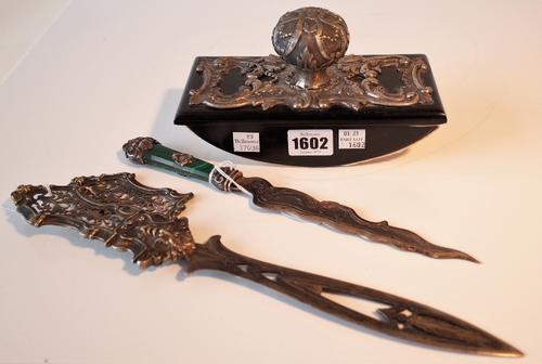 A group of foreign wares, comprising; a desk blotter, the mount detailed 800, a paper knife with pierced and partly gilt decoration (the handle...