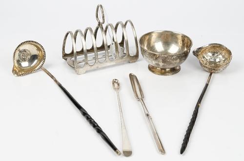 A George III silver marrow scoop, the back of the principle bowl cast with a wheat sheaf motif, London 1771, weight 55gms, two toddy ladles, each...