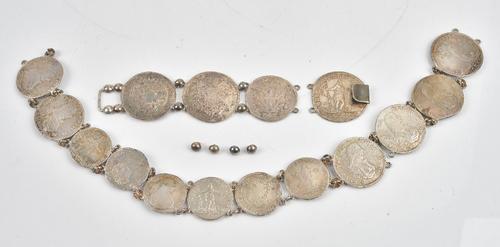 Sixteen silver European coins, including Malta, second half of the 18th century, mounted as a waistbelt and buckle, some connecting links detached,...