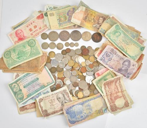 A Chinese Kiangnan 7 Mace 2 Candareens silver dollar, 1858-1958, a Canada British Columbia centenary silver one dollar 1958 and a collection of world...