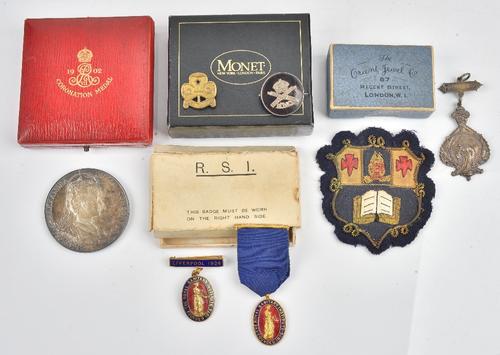 A 1902 Coronation silver medallion with the original case, two enamelled badges detailed The Royal Sanitary Institute with one box, a silver...