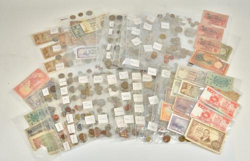 A collection of British and foreign coins, including a silver proof two pounds coin commemorating The Thirteenth Commonwealth Games 1986, cased,...