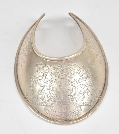 An officer's silver gorget circa 1790, the front engraved with The Royal Coat of Arms and G.R, the sides engraved with anchors within foliate...