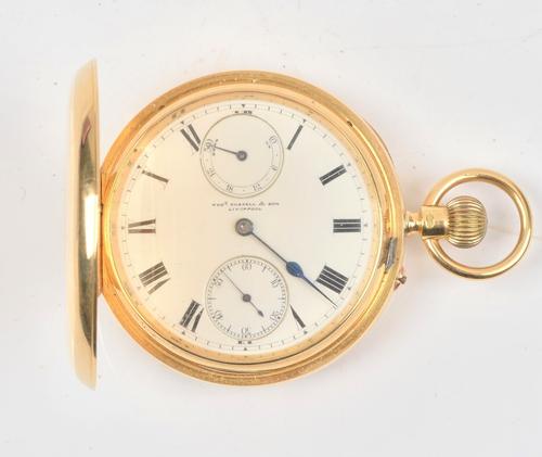 An 18ct gold cased keyless wind hunting cased gentleman's pocket watch, the gilt three quarter plate jeweled lever movement, detailed Thos Russell &...