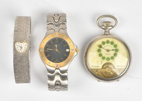 An Ebel steel and gilt metal gentleman's bracelet wristwatch, the signed black dial with gilt Arabic numerals, gilt hands, centre seconds and with a...