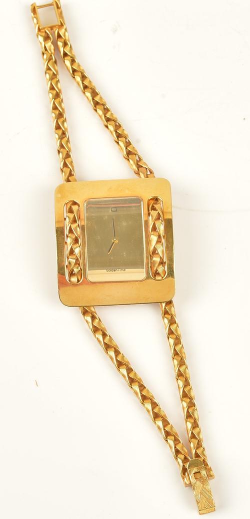 A Gubelin Swiss Golden-Time gold rectangular cased ladies bracelet wristwatch, the rectangular gilt dial with black hands and with initial G at 12...