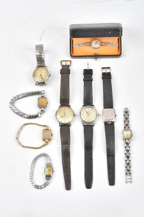 An Eterna-Matic 1000 steel cased gentleman's wristwatch, the signed silvered dial with baton numerals and with centre seconds, two further...