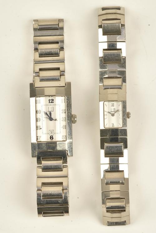 A Dunhill quartz steel rectangular cased gentleman's bracelet wristwatch, the signed white dial with black Arabic numerals, centre seconds and with a...