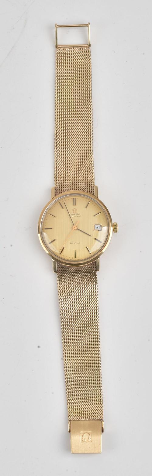 An Omega Automatic De Ville, 9ct gold circular cased gentleman's bracelet wristwatch, the signed matt gilt dial with baton shaped numerals, date of...