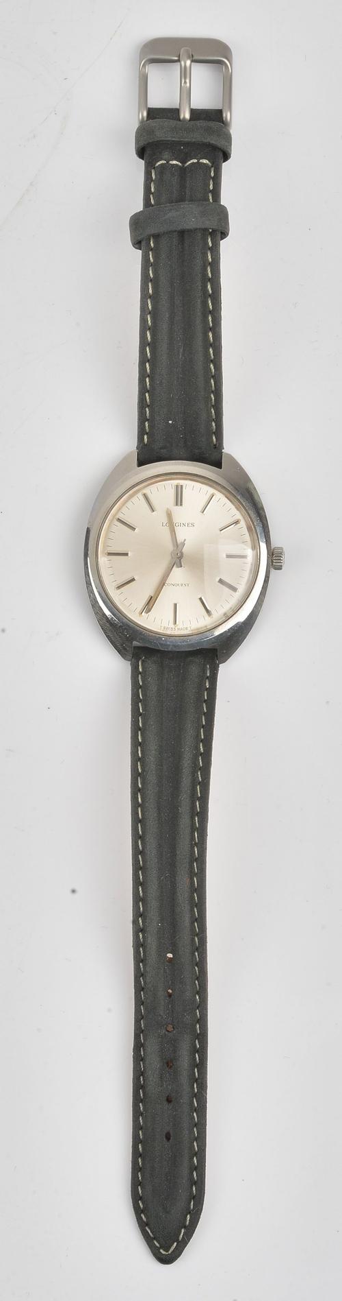 A Longines Conquest steel cased gentleman's wristwatch, the signed silvered dial with silvered baton numerals and with centre seconds, the signed...