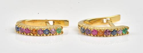 A pair of gold and varicoloured sapphire earrings, each mounted with a row of eight varicoloured sapphires, the backs with post and folding fittings,...