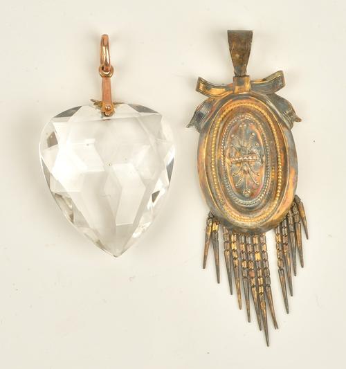 A Victorian oval pendant locket, circa 1860, with applied bead and wirework decoration, the top with a bow surmount, the bottom with pendant tassel...