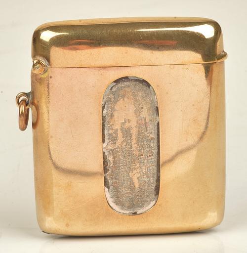 A 9ct gold rectangular vesta case, the front with a match striking panel, otherwise plain, Birmingham 1911, gross weight including match striking...