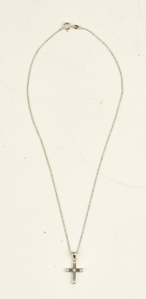 A white gold and diamond set pendant cross, mounted with five circular cut diamonds, with a white gold faceted bead link neckchain detailed 750, on a...