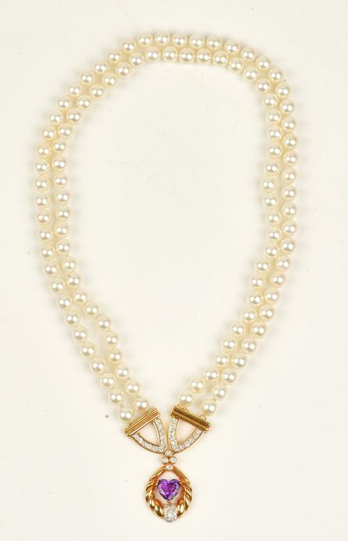 A gold, diamond, amethyst and cultured pearl necklace, the front claw set with a heart shaped amethyst and otherwise mounted with circular cut...