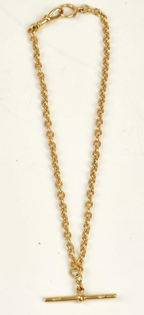 An 18ct gold oval link watch Albert chain fitted with an 18ct gold T-bar, a gold bolt ring and with an 18ct gold swivel, weight 29.2 gms.