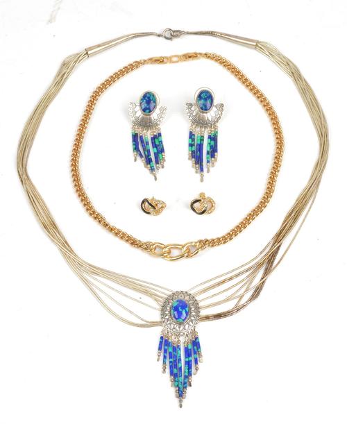 A Christian Dior gold plated, colourless paste set and black enamelled necklace and earring suite, the necklace comprised of three interlinking...