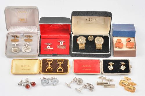 A pair of silver cufflinks, having pierced oval fronts and with folding bar fittings at the backs, detailed 925 and eleven further pairs of...