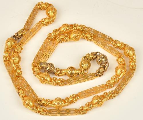 A Victorian gold longchain, in an integral pierced bar and multiple link design, mid 19th century, length approx 98cm, weight, 77.5 gms.