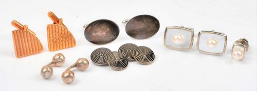 A pair of silver, mother-of-pearl and cultured pearl cufflinks, with folding bar fittings to the backs and a matching tie stud, with a case, a pair...