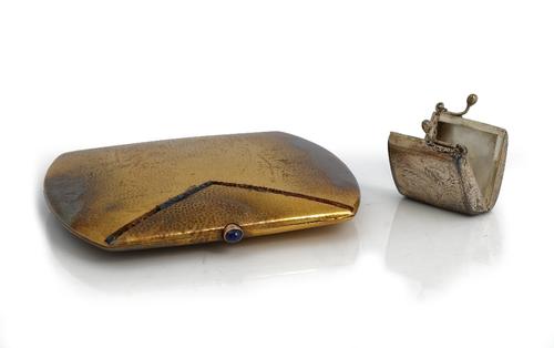 A gold curved rectangular cigarette case, presentation inscribed within and detailed 585, the exterior with martele decoration, formerly gem set,...