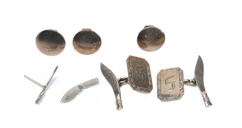 A group of gold jewellery, comprising; a pair of cufflinks, with cut cornered rectangular fronts detailed 9 CT and with Kukri shaped backs, two...