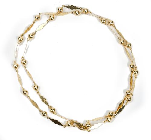 A gold necklace, in a bead and tapered panel shaped link design, detailed 750, on a boltring clasp, length 79.5cm, gross weight 21.7 gms.