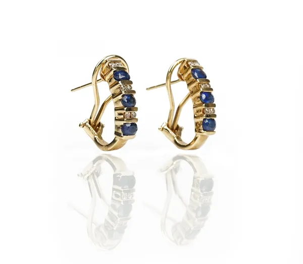A pair of gold, sapphire and diamond earclips