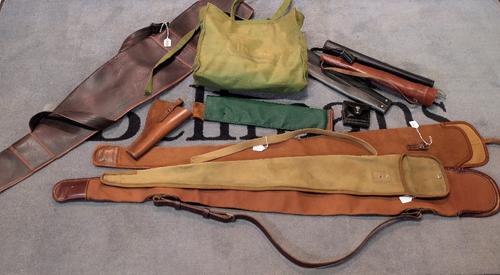 Three canvas gun slips and one leather, together with a quantity of quivers and pistol holsters, (qty).