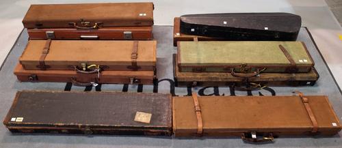 Ten various rectangular travelling shotgun cases and a wooden violin case, (11).