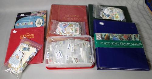 The Empire Postage stamp album containing a sparse world collection including Great Britain, a similar album, six further albums of all-world stamps...