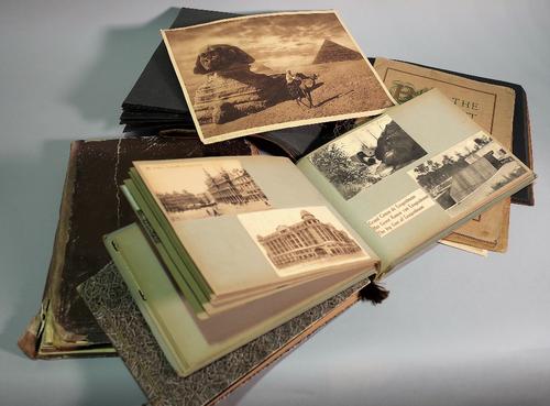 A Second World War period photograph album, R.A.F., two albums of postcards, a late Victorian/Edwardian album of scraps and other items, (qty).