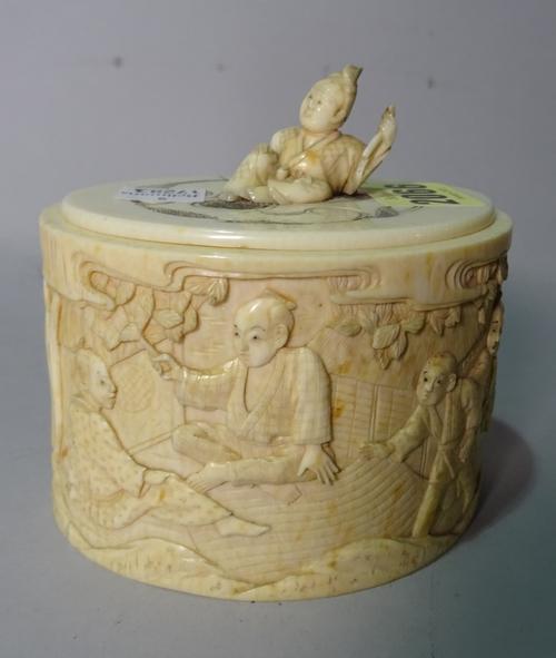 A Japanese Meiji period ivory box and cover, 10cm wide x 10cm high, (a.f).