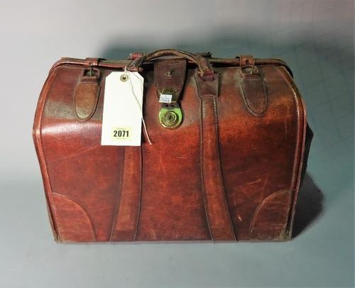 An early 20th century leather doctor's bag, 45cm wide x 33cm high.