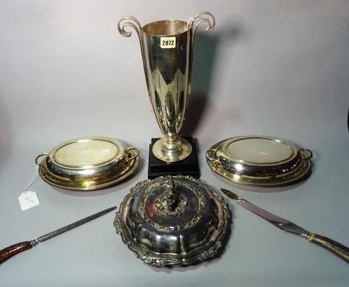 Silver plated wares, a set of three Victorian oval graduated galleried trays, together with six entree dishes, an oval tureen and cover and a twin...