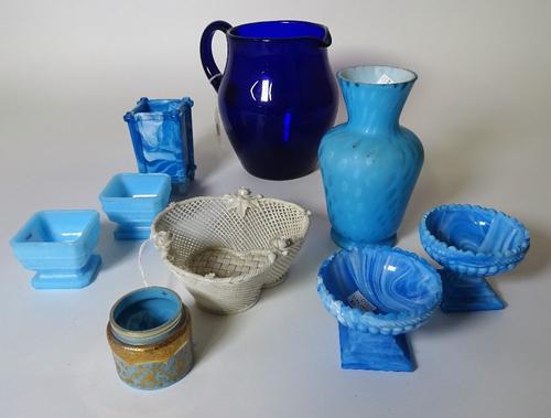 A Belleek heart shape porcelain basket, the ropetwist rim applied with roses, 14cm, a turquoise satin glass vase, 16cm high, a pair of Davidson...