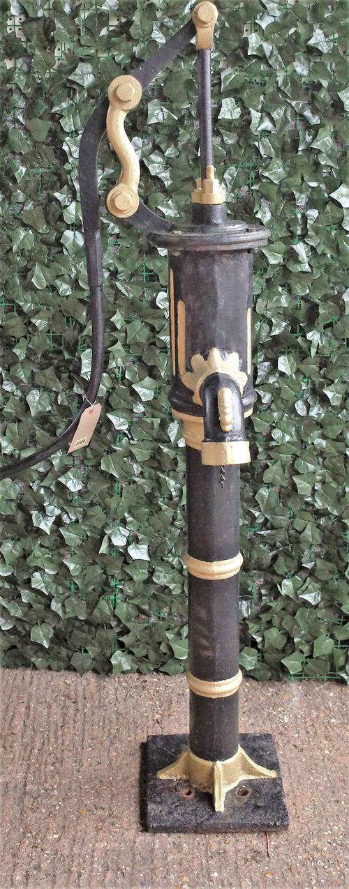 A 19th century later black painted cast iron water pump, 170cm high.