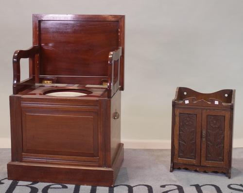 An early 20th century mahogany box commode and a small oak wall cabinet with carved decoration, 56cm wide x 60cm high, (2).