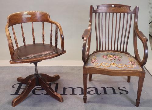 An early 20th century oak tub back office swivel chair, 82cm high, and an Edwardian walnut inlaid armchair, 60cm wide x 88cm high, (2).