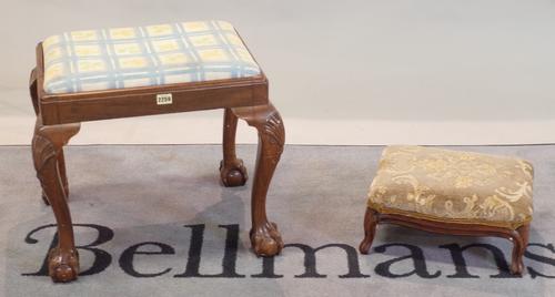A George II style mahogany rectangular footstool, on ball and claw feet, 53cm wide x 47cm high, another smaller rectangular footstool, 37cm wide x...