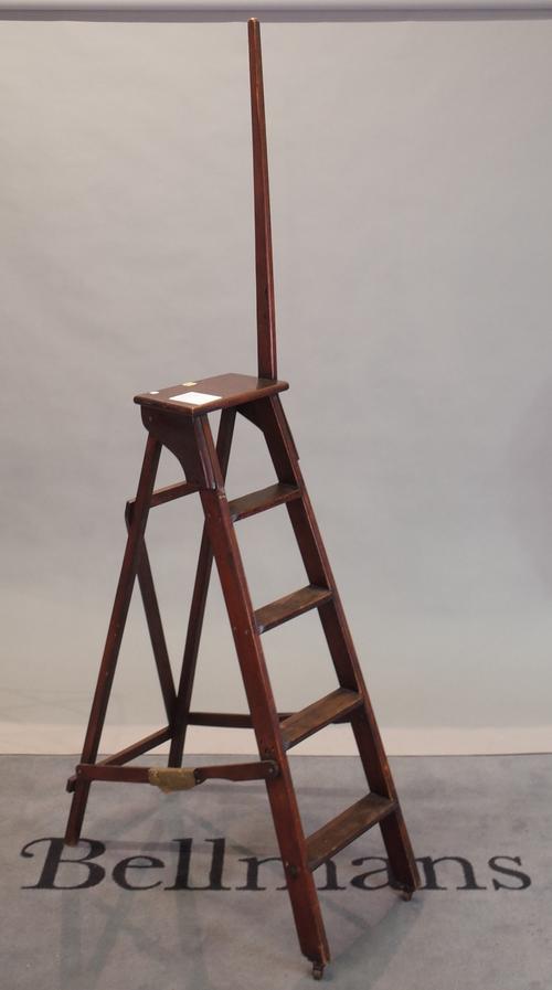 An early 20th century stained beech 'A' frame step ladder, 35cm wide x 212cm high.