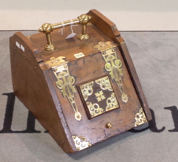 An Aesthetic period walnut brass mounted coal purdonium, with pierced hinges and tubular handle, 34cm wide x 34cm high.