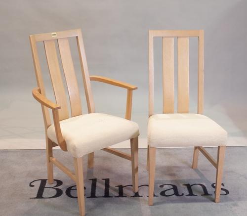 A set of eight modern stick back dining chairs, to include a pair of carvers, 58cm wide x 94cm high, (8).