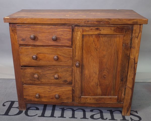 A modern hardwood side cabinet, with four short drawers, flanked by cupboard door on block supports, 105cm wide x 86cm high.