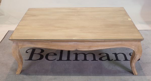 A grey painted hardwood rectangular coffee table on cabriole supports, 120cm wide x 41cm high.