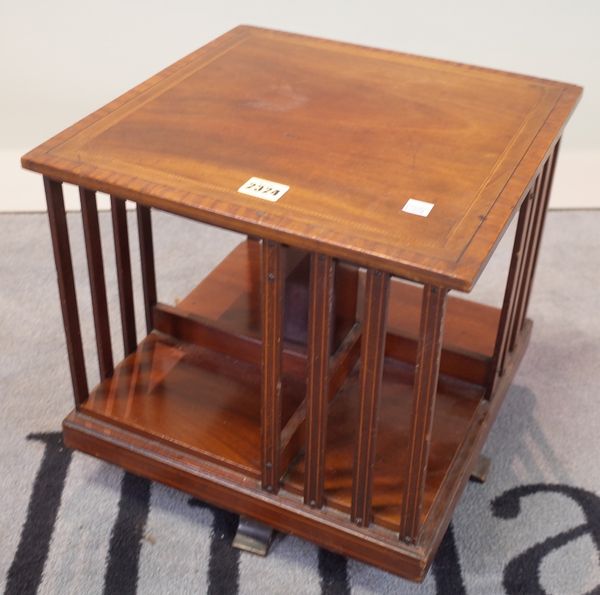 An Edwardian mahogany and satinwood banded revolving bookcase, 35cm wide x 35cm high.